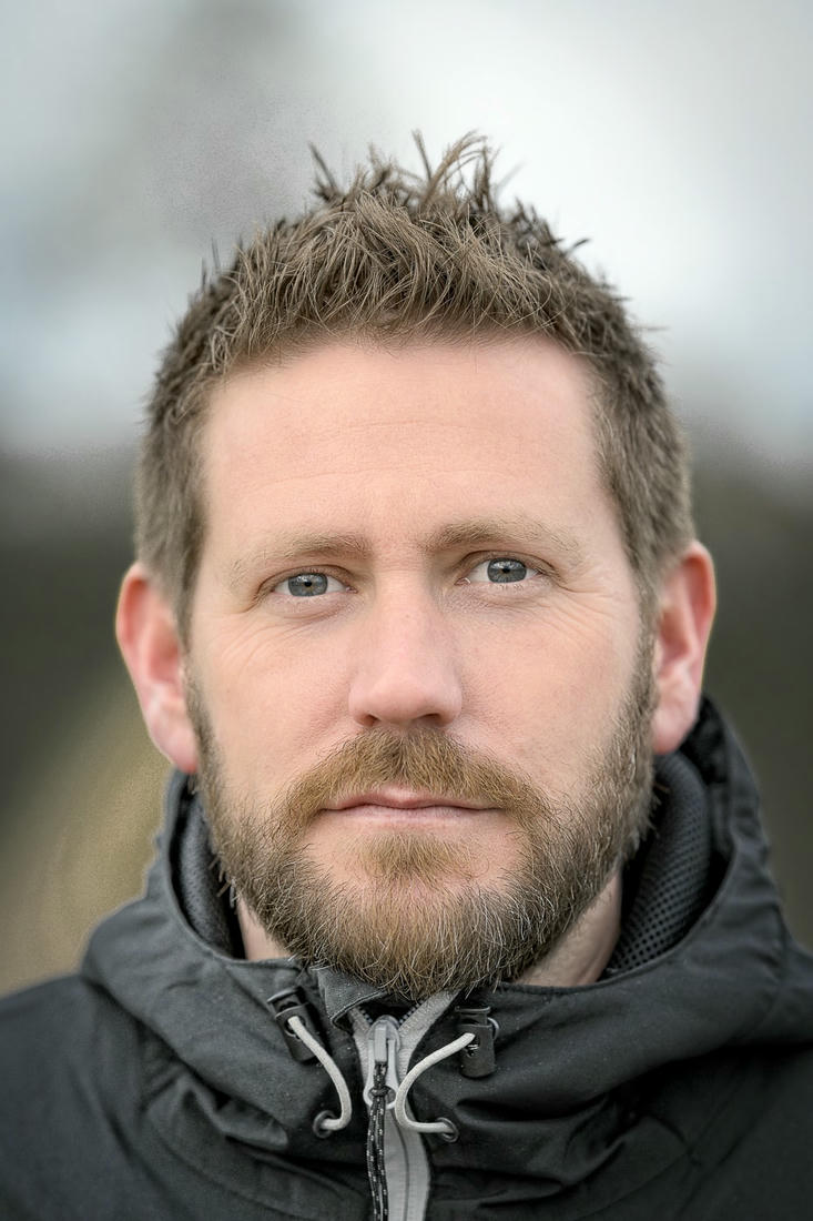 Porträtfoto von Mann kurzen Haaren und Bart aus Münster